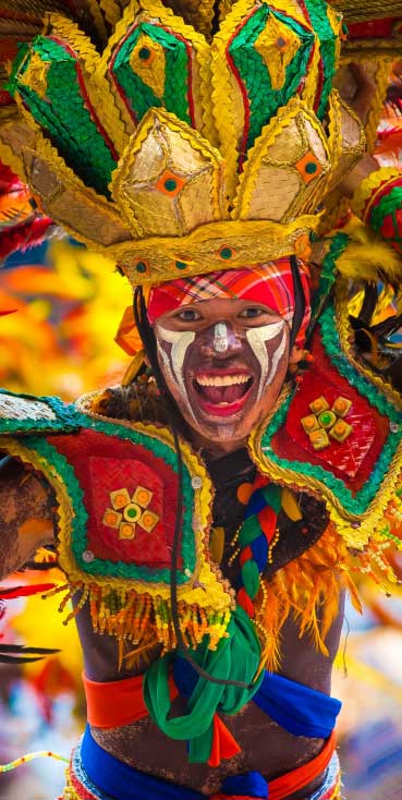 Vibrant cultural festival performer in colorful traditional costume at Wvec West Valley Events Complex, Phoenix, Arizona.
